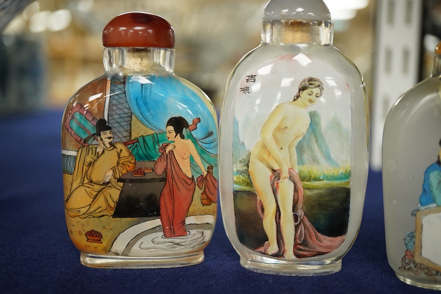Four Chinese inside painted glass snuff bottles, tallest 9cm